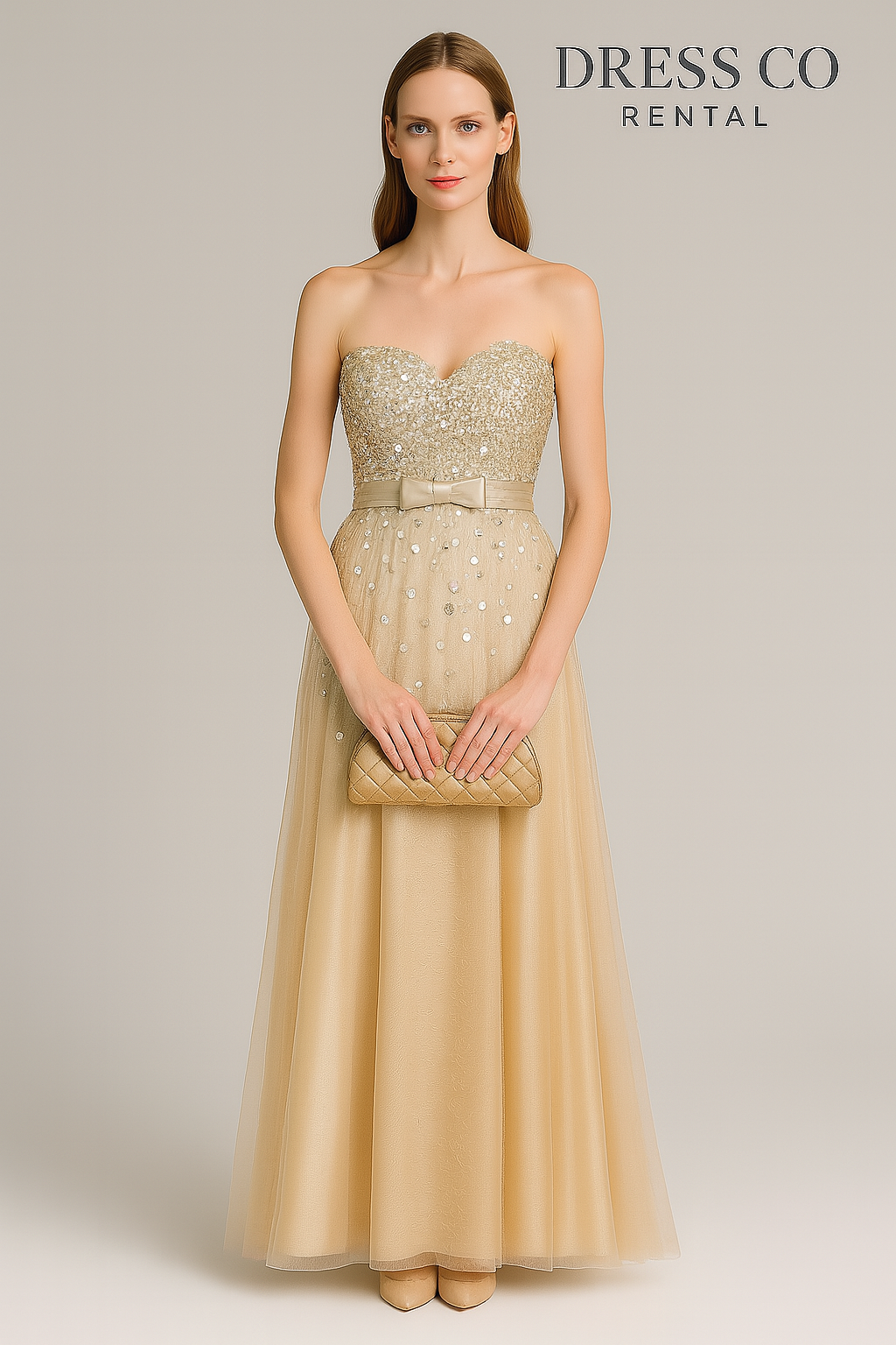 Cream strapless evening dress decorated with sequins and a luxurious bow.
