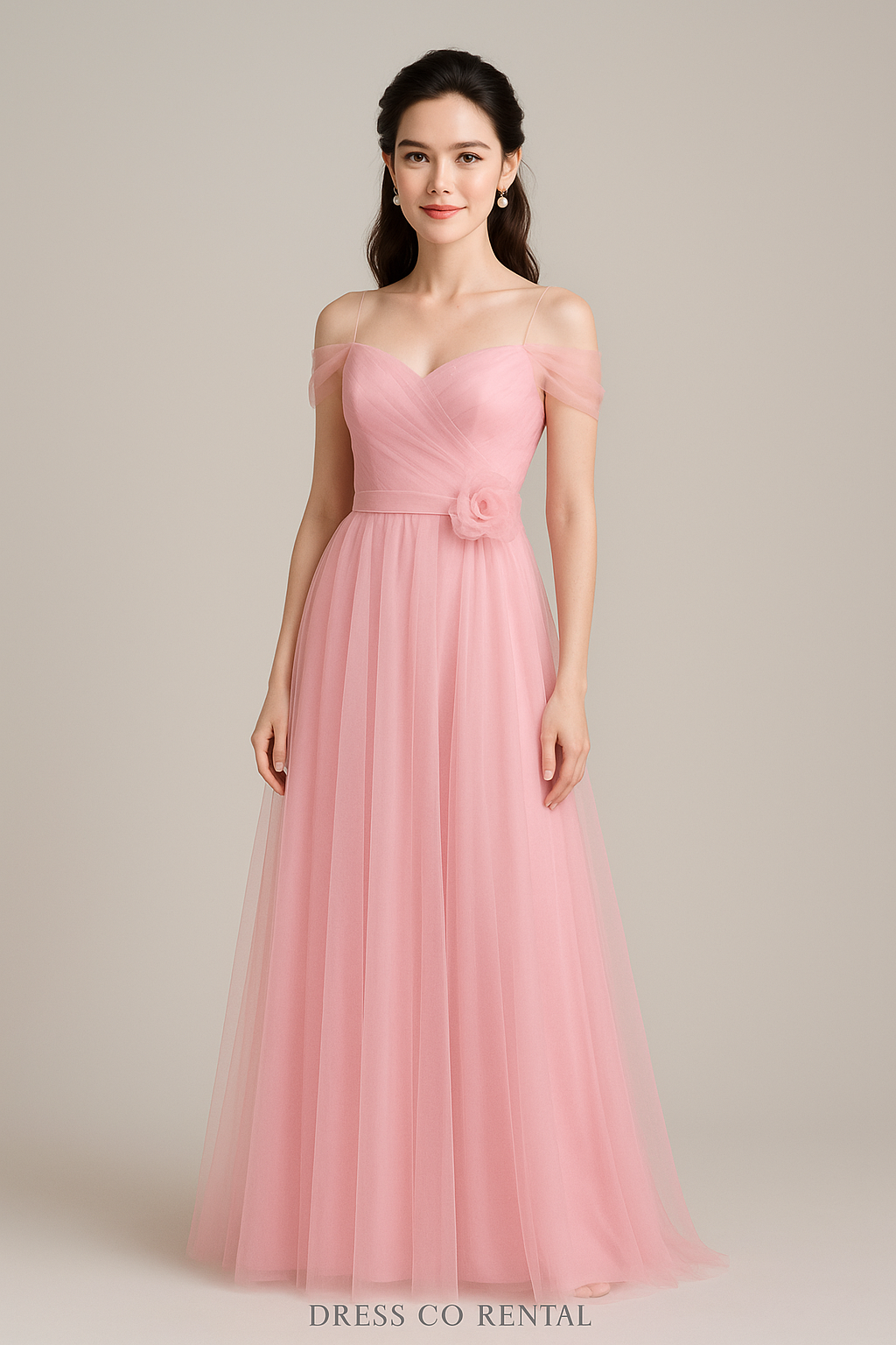 Light pink long evening dress with see-through straps and flower decorations